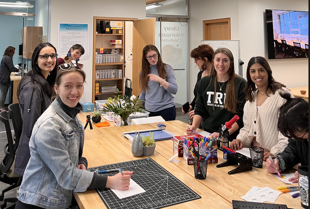 Education Students using the Button Maker