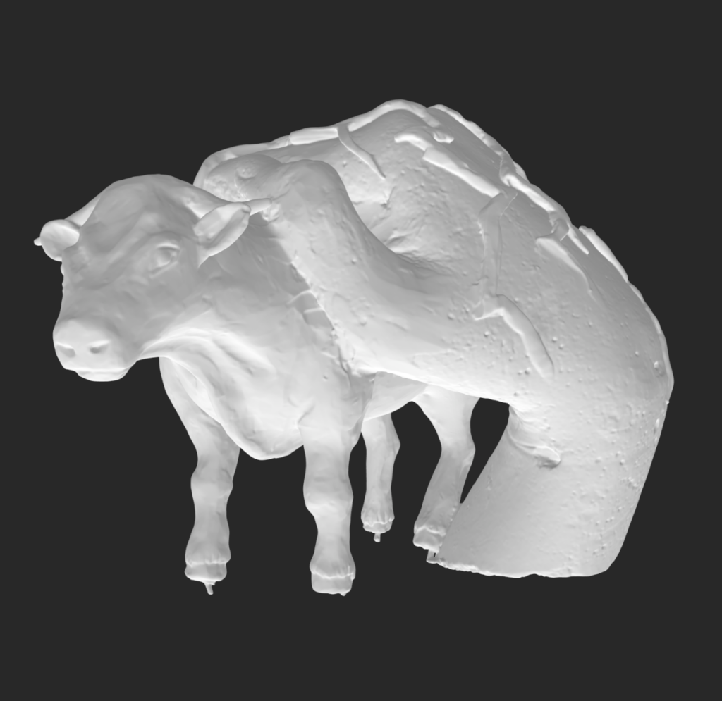 3D scan of a sculpture of a plasticine cow held by a hand on the cow's back.