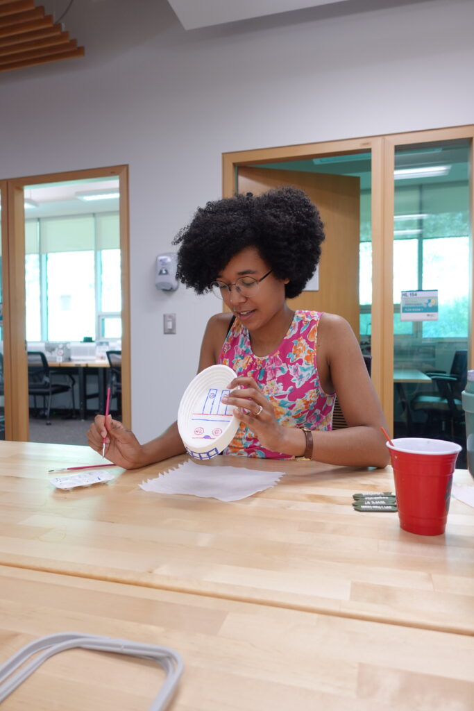 a student painting a 3d model