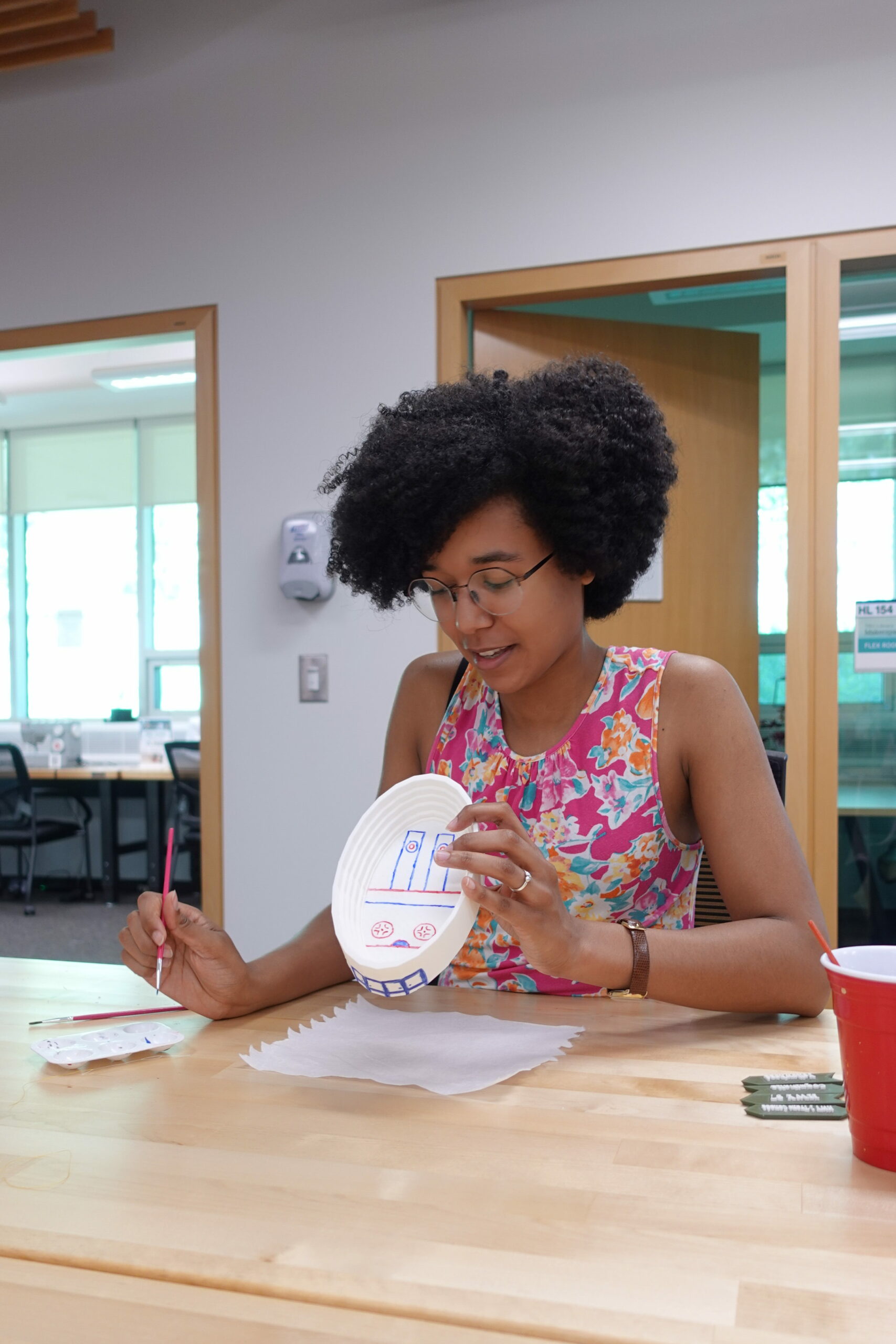 a student painting a 3d model