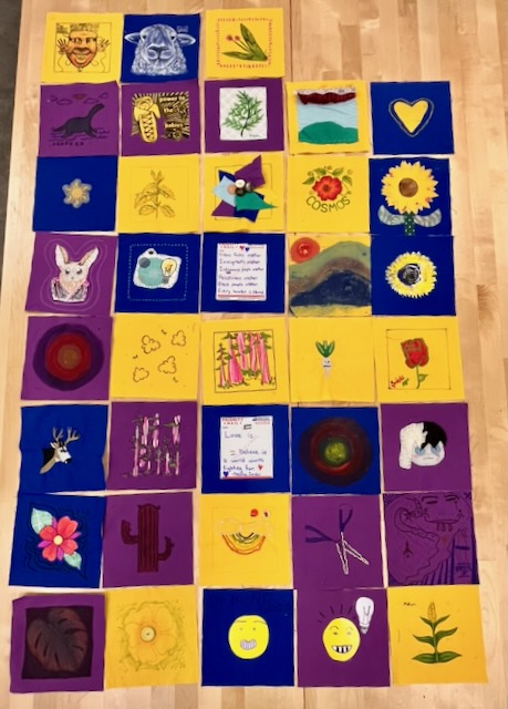 quilt squares laid out on a table